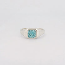 BACCHUS signet ring in recycled sterling silver, set with a radiant-cut blue zircon. Handmade in Melbourne by AGOVIA.