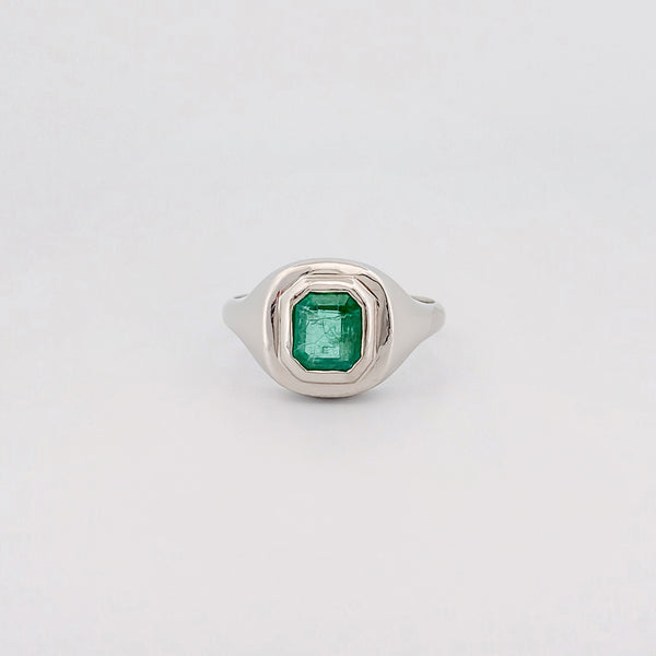 CEDAR signet ring in platinum, set with an emerald-cut Zambian emerald. Handmade in Melbourne by AGOVIA.