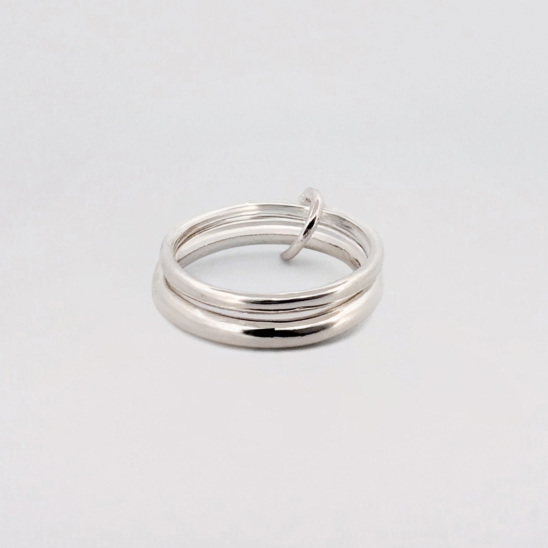 JUNO Ring in recycled sterling silver, twin OLE bands joined by a smaller silver ring. Handmade in Melbourne by AGOVIA.