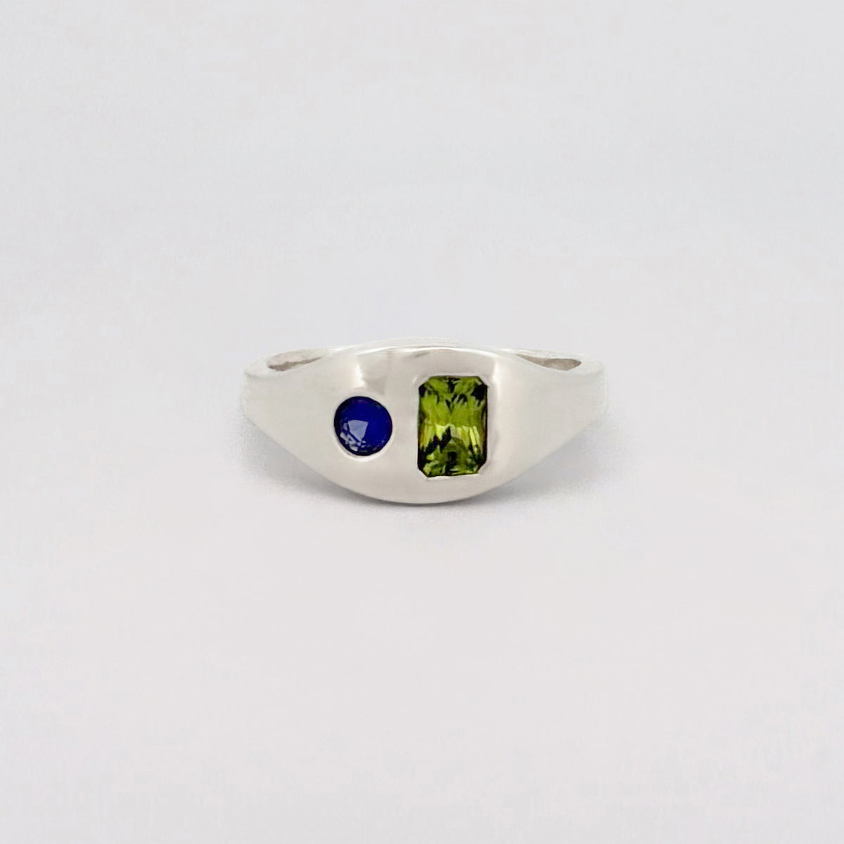 MILO signet ring in Argentium silver, set with a Ceylon sapphire and Pakistani peridot. Handmade in Melbourne by AGOVIA.