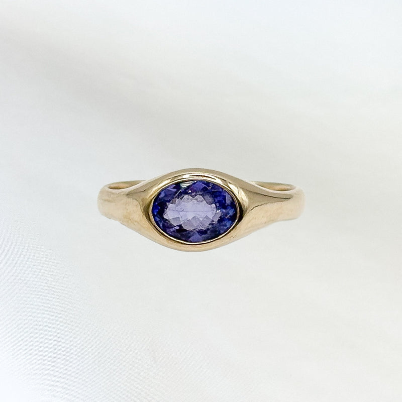OO Ring in 9ct yellow gold, set with a 6x4mm oval-cut tanzanite. Handmade in Melbourne by AGOVIA.